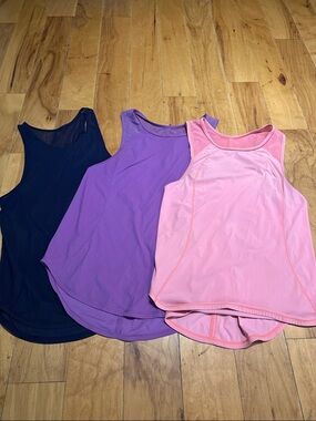 Set of 3 Lululemon Women’s Performance Tank Top size small- Pink, Purple, Navy